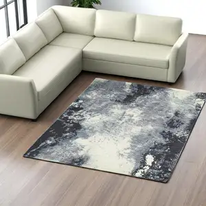 Photo of Navy And Ivory Abstract Power Loom Stain Resistant Area Rug