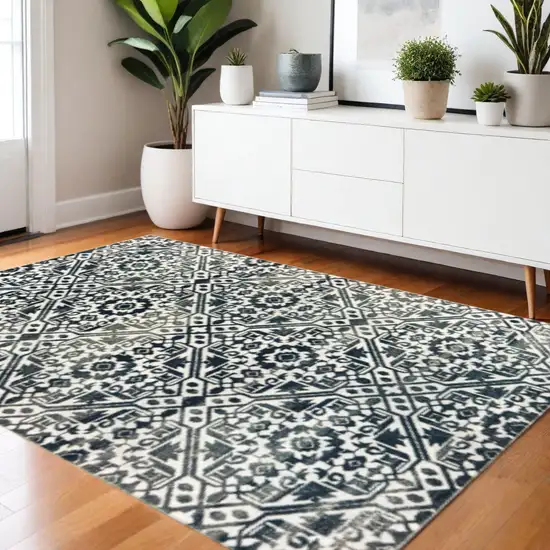 Navy And Ivory Geometric Power Loom Stain Resistant Area Rug Photo 1