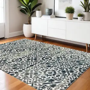 Photo of Navy And Ivory Geometric Power Loom Stain Resistant Area Rug