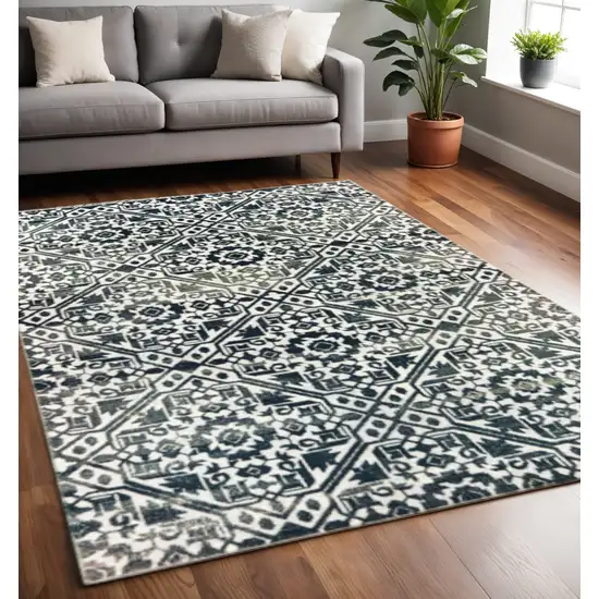 Navy And Ivory Geometric Power Loom Stain Resistant Area Rug Photo 1