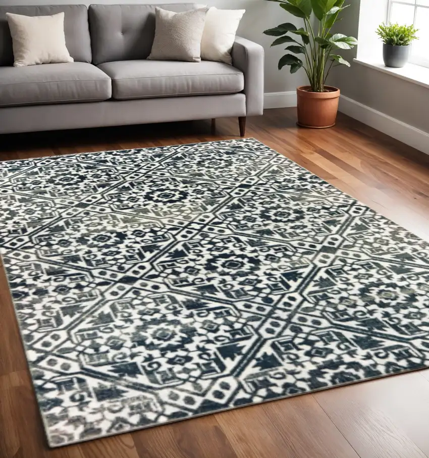 Navy And Ivory Geometric Power Loom Stain Resistant Area Rug Photo 1
