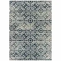 Photo of Navy And Ivory Geometric Power Loom Stain Resistant Area Rug
