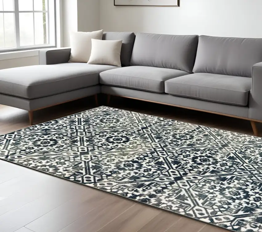Navy Blue And Ivory Geometric Distressed Area Rug Photo 1