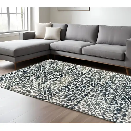 Navy And Ivory Geometric Power Loom Stain Resistant Area Rug Photo 1