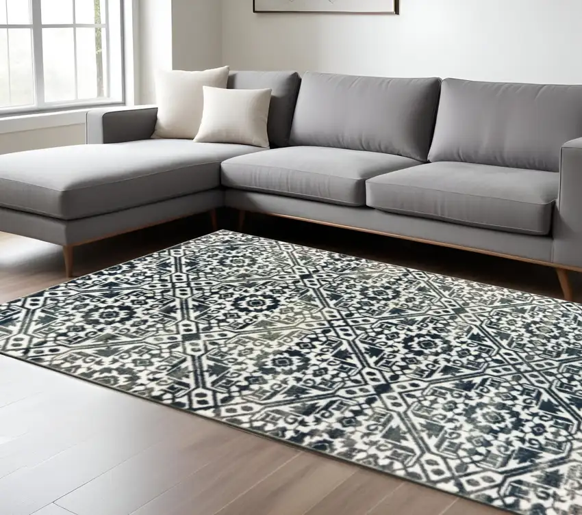 Navy And Ivory Geometric Power Loom Stain Resistant Area Rug Photo 1