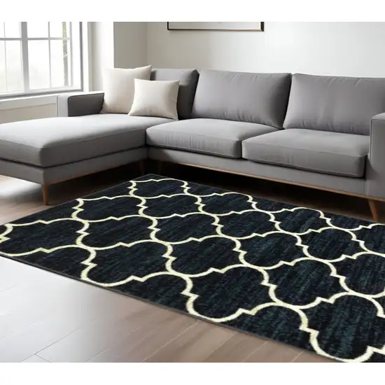 Navy And Ivory Geometric Power Loom Stain Resistant Area Rug Photo 1