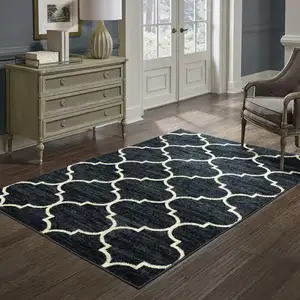 Photo of Navy And Ivory Geometric Power Loom Stain Resistant Area Rug