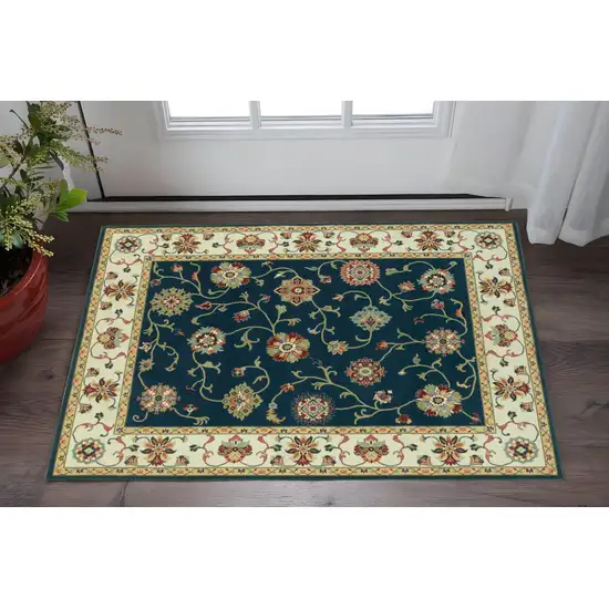 2' X 4' Navy And Ivory Oriental Power Loom Stain Resistant Area Rug Photo 1