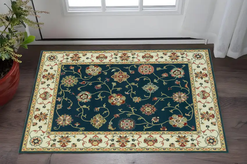 2' X 4' Navy And Ivory Oriental Power Loom Stain Resistant Area Rug Photo 1