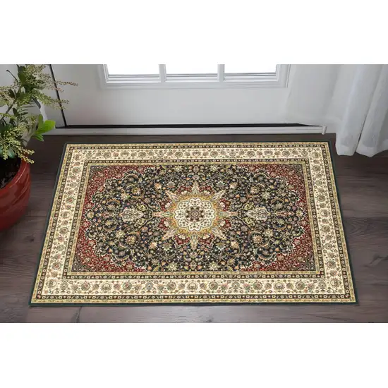 2' X 4' Navy And Ivory Oriental Power Loom Stain Resistant Area Rug Photo 1