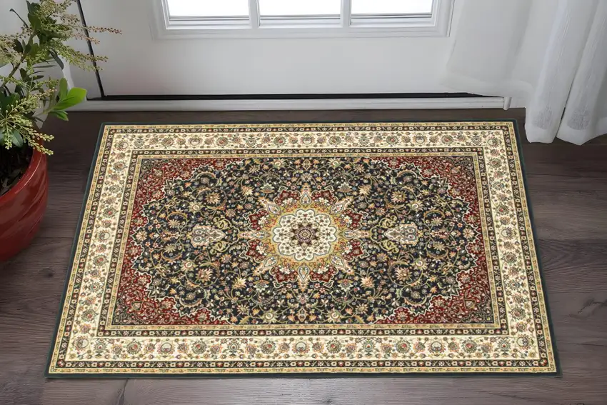 2' X 4' Navy And Ivory Oriental Power Loom Stain Resistant Area Rug Photo 1