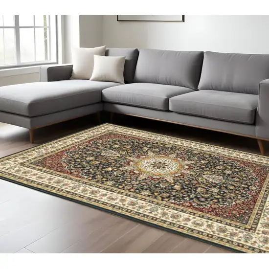 6' X 9' Navy And Ivory Oriental Power Loom Stain Resistant Area Rug Photo 1