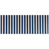 Photo of Navy And Sand Striped Tufted Washable Non Skid Area Rug