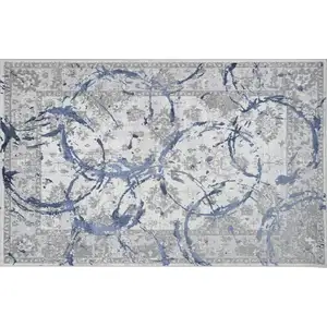 Photo of Navy Blue Abstract Area Rug With Fringe