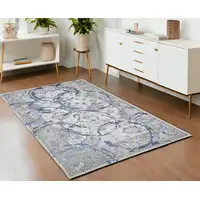 Photo of Navy Blue Abstract Area Rug With Fringe