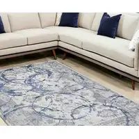 Photo of Navy Blue Abstract Area Rug With Fringe