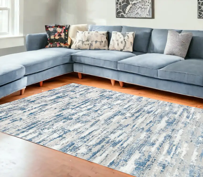 10' Blue and Off White Abstract Washable Non Skid Runner Area Rug Photo 1