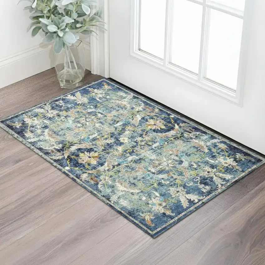 Navy Blue And Beige Floral Distressed Area Rug Photo 1