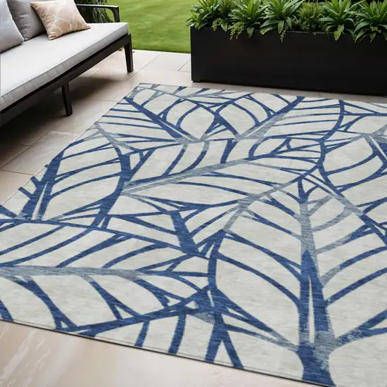 Navy Blue And Beige Floral Washable Indoor Outdoor Area Rug Photo 1