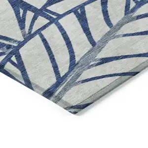 Photo of Navy Blue And Beige Floral Washable Indoor Outdoor Area Rug