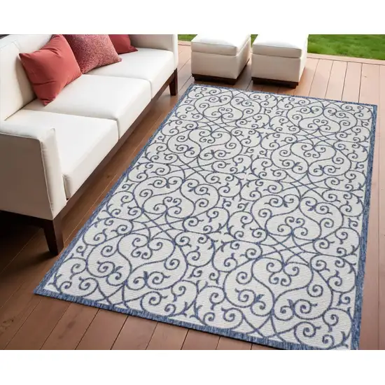 Navy Blue And Beige Geometric Indoor Outdoor Area Rug Photo 1