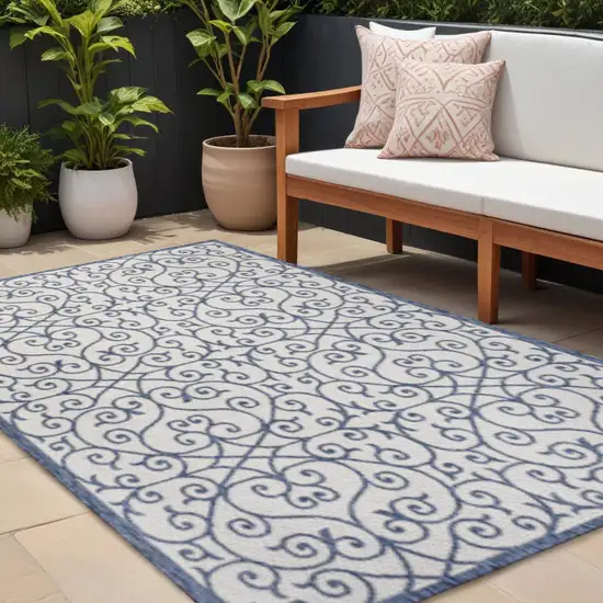 Navy Blue And Beige Geometric Indoor Outdoor Area Rug Photo 1