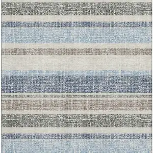 Photo of Navy Blue And Beige Striped Washable Area Rug With UV Protection
