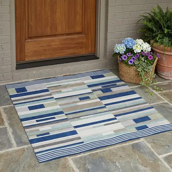 Navy Blue And Blue Striped Washable Indoor Outdoor Area Rug Photo 1