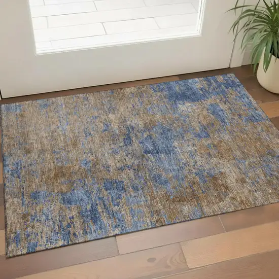 Navy Blue And Brown Abstract Washable Area Rug With UV Protection Photo 1