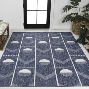 Photo of Navy Blue And Cream Geometric Indoor Outdoor Area Rug