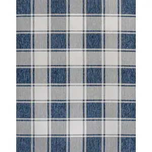 Photo of Navy Blue And Cream Gingham Indoor Outdoor Area Rug
