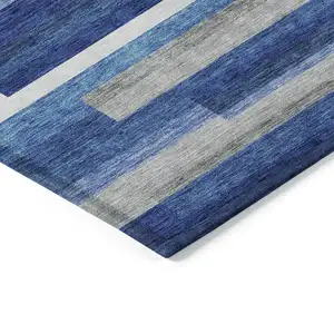 Photo of Navy Blue And Denim Blue Striped Washable Indoor Outdoor Area Rug