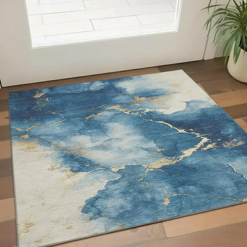 Navy Blue And Gold Abstract Washable Area Rug With UV Protection Photo 2
