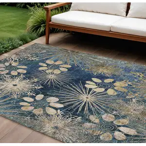 Photo of Navy Blue And Gold Floral Washable Indoor Outdoor Area Rug