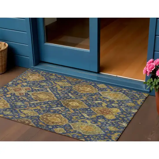 Navy Blue And Gold Ikat Washable Indoor Outdoor Area Rug Photo 1