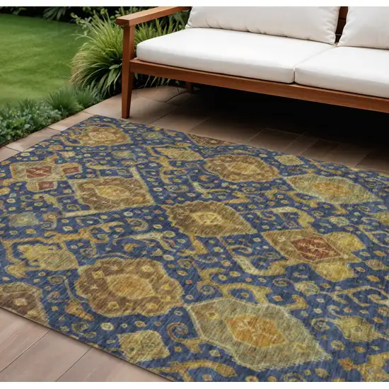 Navy Blue And Gold Ikat Washable Indoor Outdoor Area Rug Photo 1