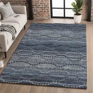 Photo of Navy Blue And Gray Abstract Geometric Washable Area Rug With UV Protection