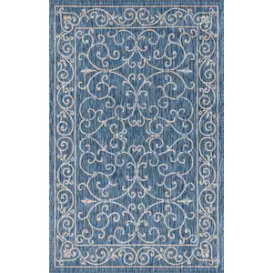 Photo of Navy Blue And Gray Medallion Indoor Outdoor Area Rug