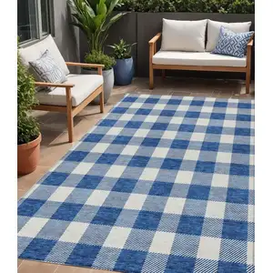 Photo of Navy Blue And Gray Plaid Washable Indoor Outdoor Area Rug