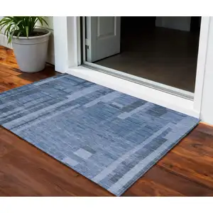 Photo of Navy Blue And Gray Striped Washable Indoor Outdoor Area Rug