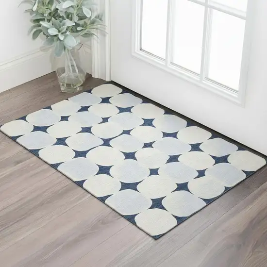 Navy Blue And Ivory Abstract Geometric Washable Area Rug With UV Protection Photo 1