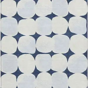 Photo of Navy Blue And Ivory Abstract Geometric Washable Area Rug With UV Protection