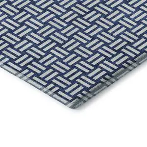 Photo of Navy Blue And Ivory Abstract Geometric Washable Area Rug With UV Protection