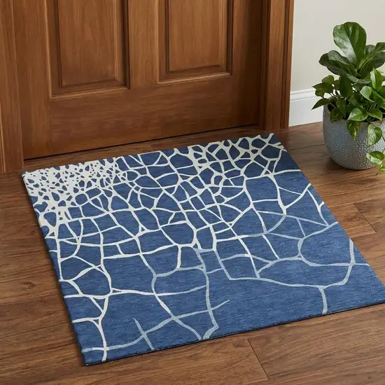 Navy Blue And Ivory Abstract Geometric Washable Area Rug With UV Protection Photo 1