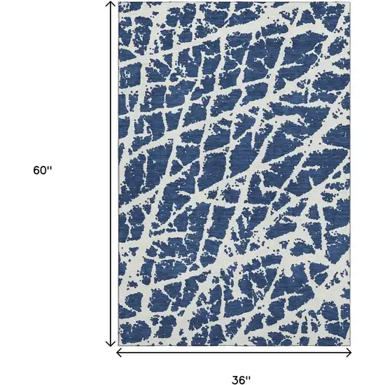 Navy Blue And Ivory Abstract Washable Area Rug With UV Protection Photo 9