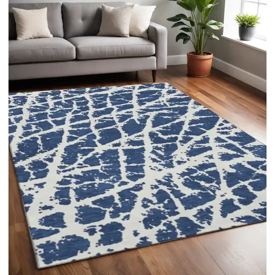 Navy Blue And Ivory Abstract Washable Area Rug With UV Protection Photo 2