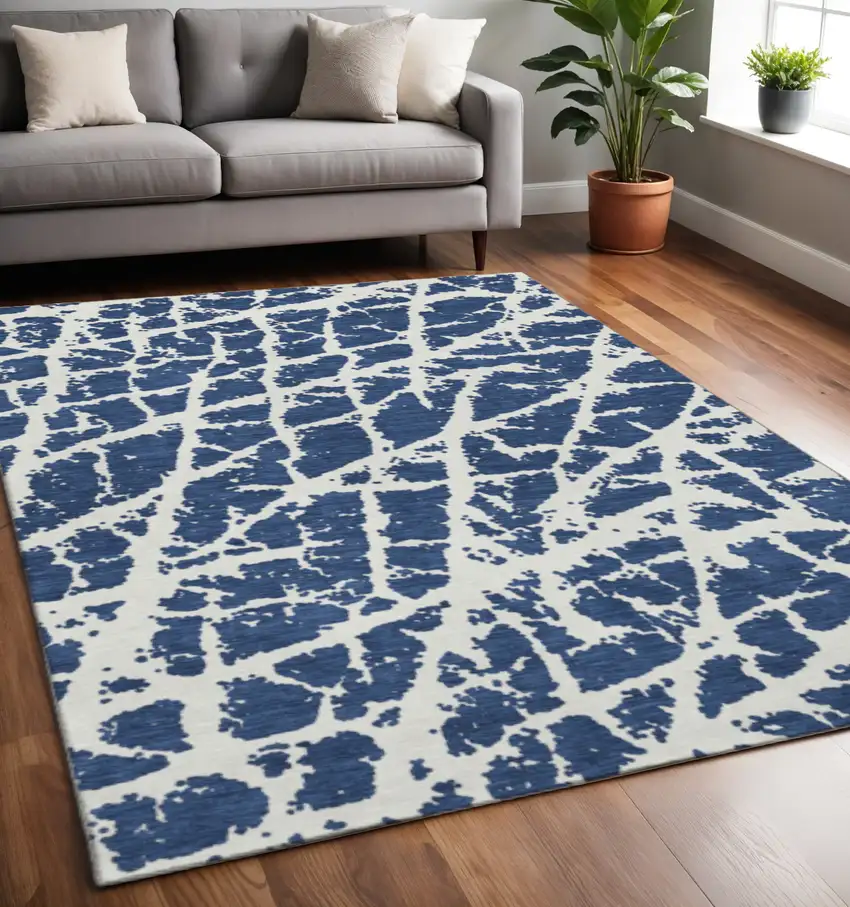 Navy Blue And Ivory Abstract Washable Area Rug With UV Protection Photo 2