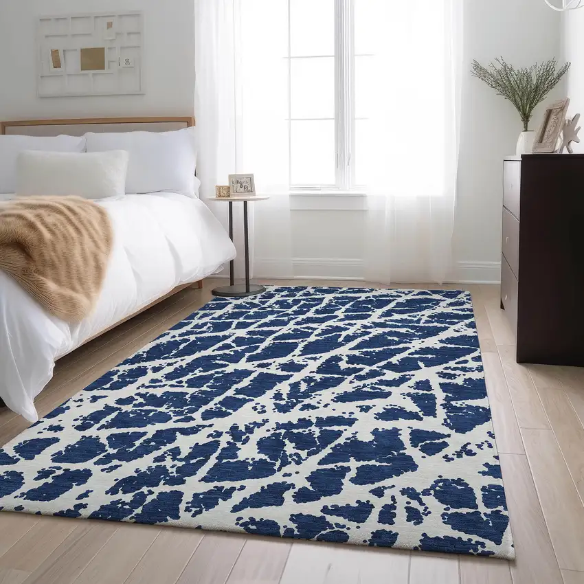 Navy Blue And Ivory Abstract Washable Area Rug With UV Protection Photo 4
