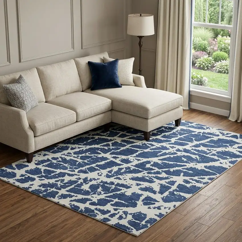 Navy Blue And Ivory Abstract Washable Area Rug With UV Protection Photo 1