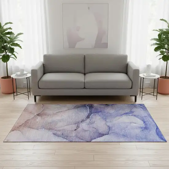 Navy Blue And Ivory Abstract Washable Area Rug With UV Protection Photo 1